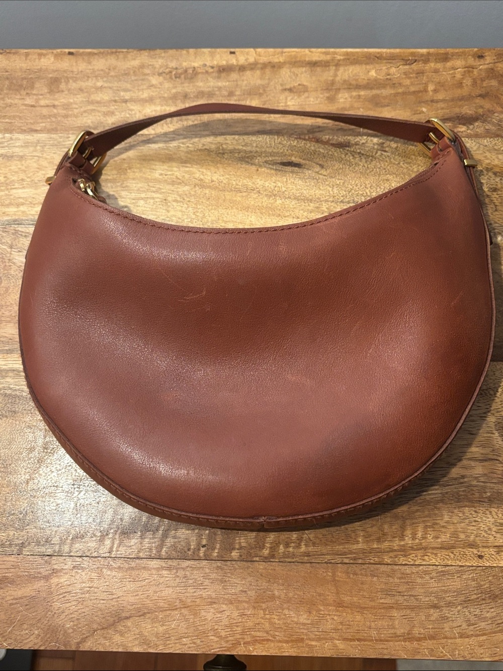 Madewell Crescent Crossbody Bag in Chestnut Brown also comes with short strap